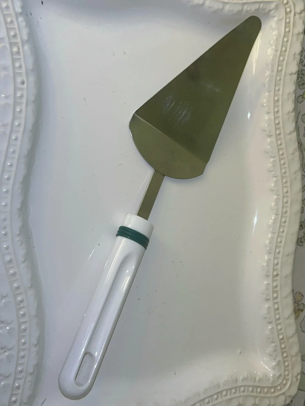 Chromium-plated cake and pie server White and green handle